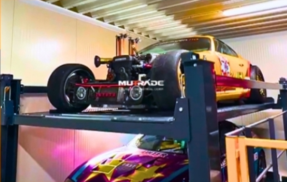 Elevating Racing Heritage: A Custom Car Parking Stacker Installation in a Private Garage 